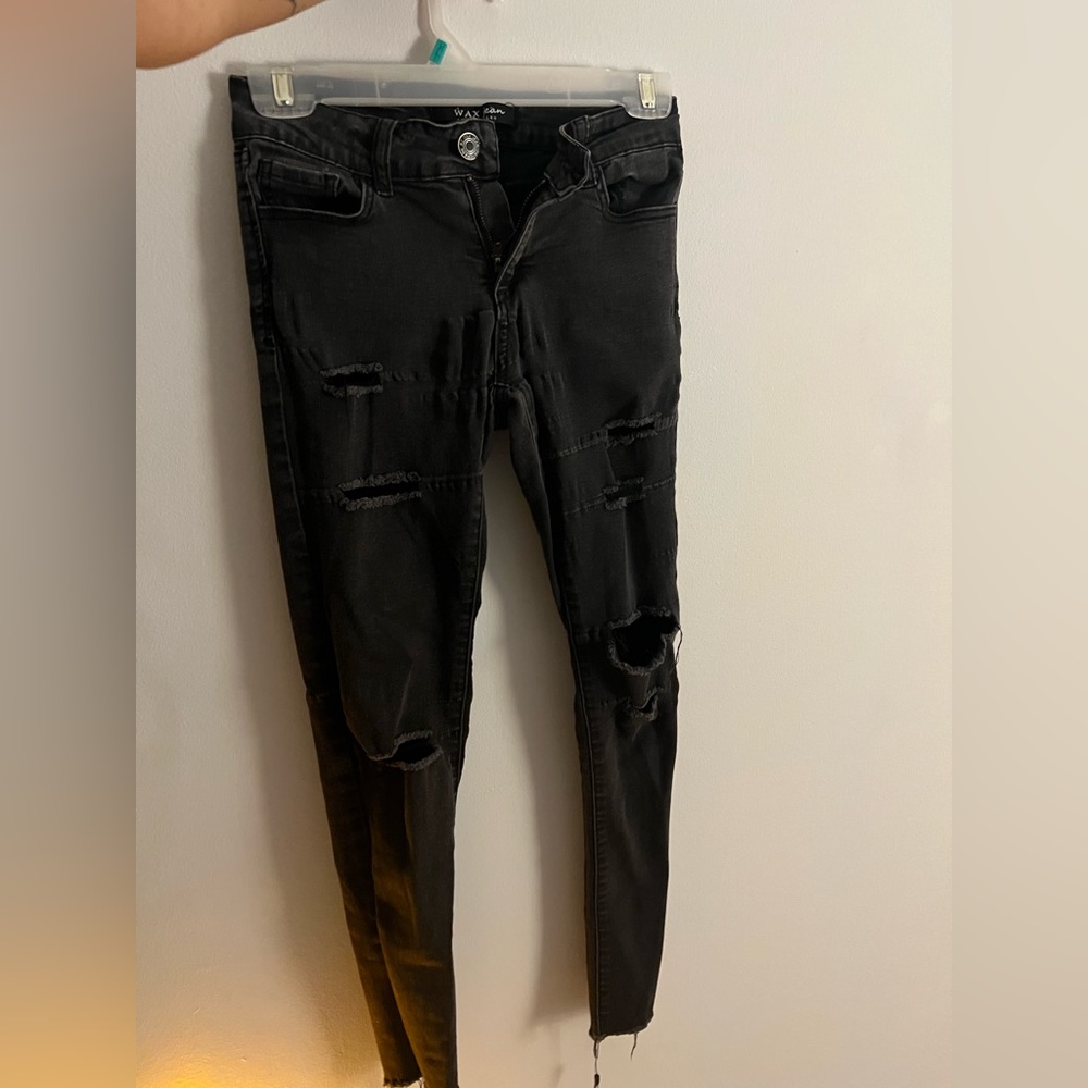 black jeans with holes